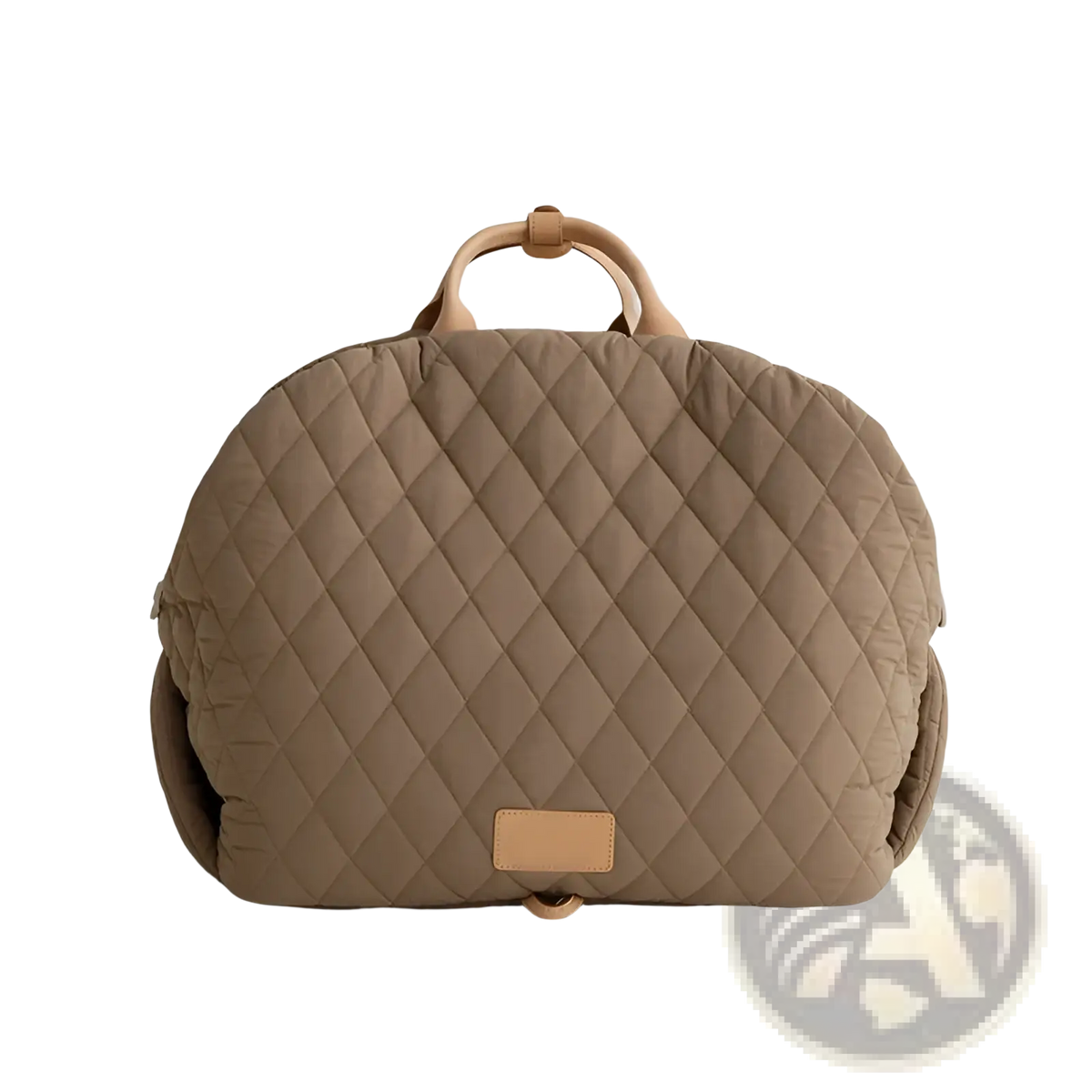 Beige quilted travel pet carrier bag with tan leather handles and matching leather patch for easy carrying
