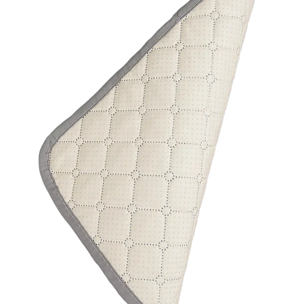 Gray quilted waterproof pet mat with subtle diamond pattern and contrasting white dotted backing washable furniture protector