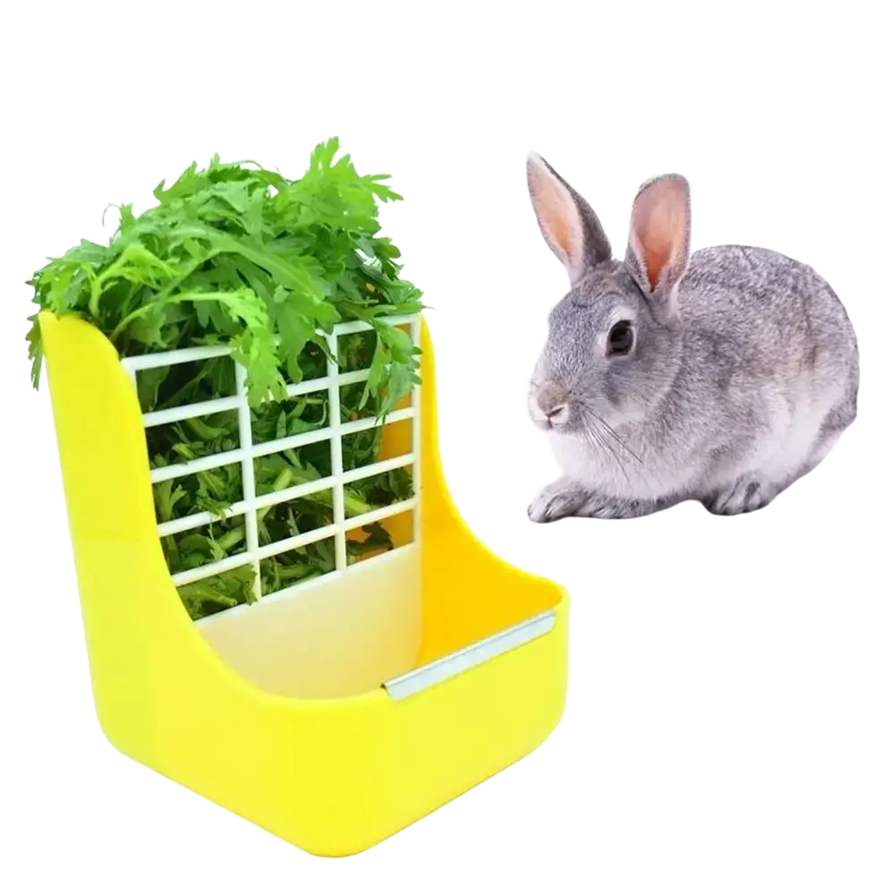 Bright yellow plastic rabbit hay feeder with white grid insert containing green leafy vegetables for small animals