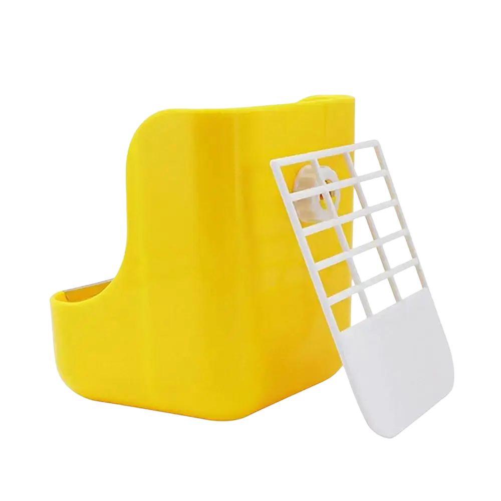 Bright yellow plastic rabbit hay feeder with white grid insert for small animal rack used by farm animals