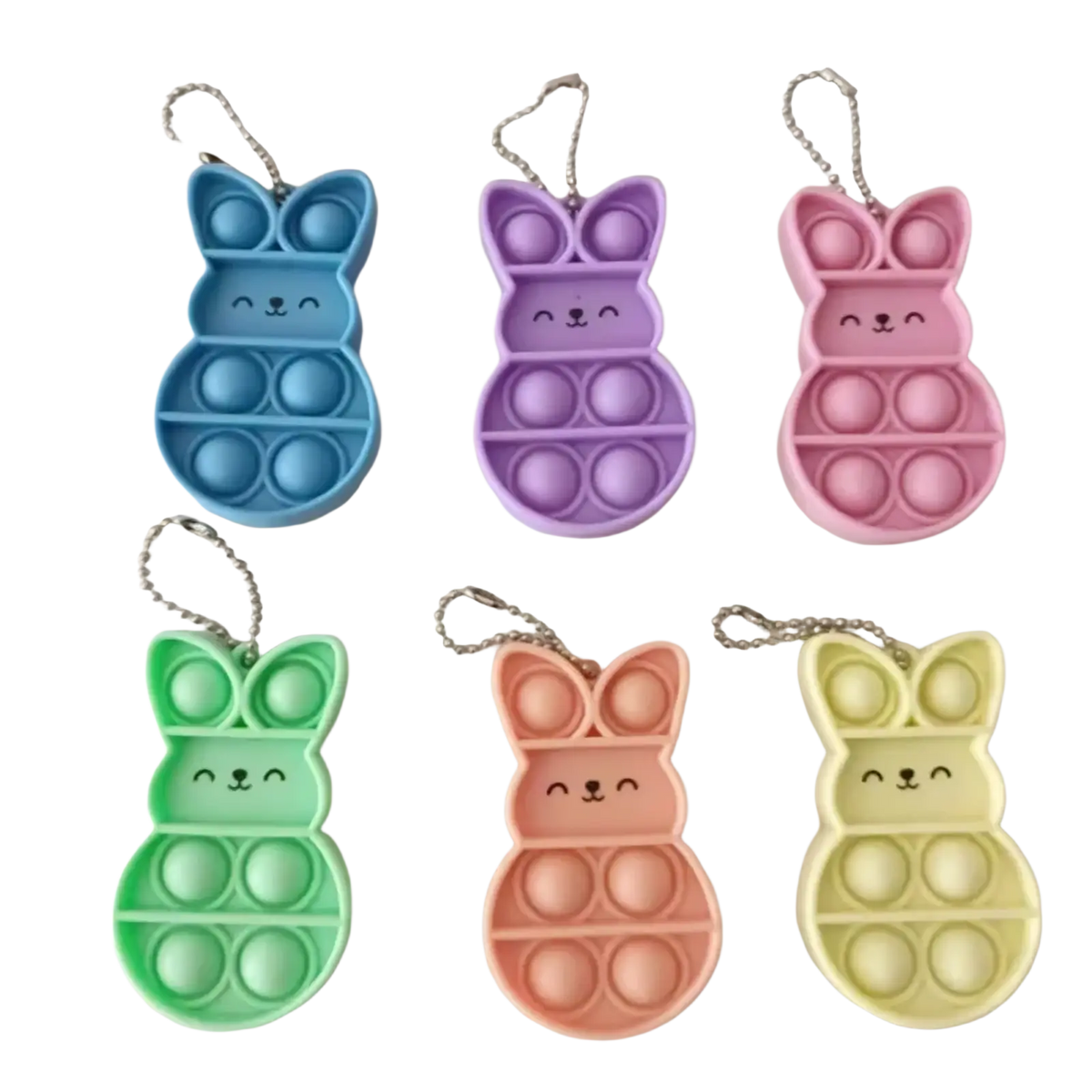 Pastel-colored rabbit pop it fidget keychains with soft silicone bodies and metallic chain attachments
