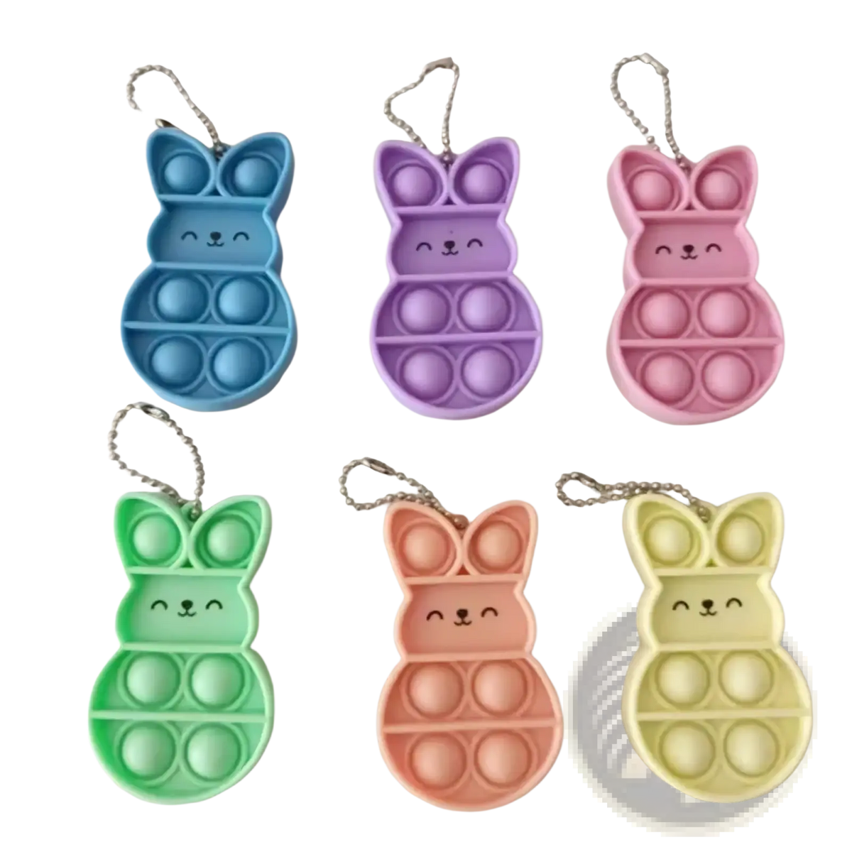Pastel-colored rabbit pop it fidget keychains with soft silicone bodies and metallic chain attachments