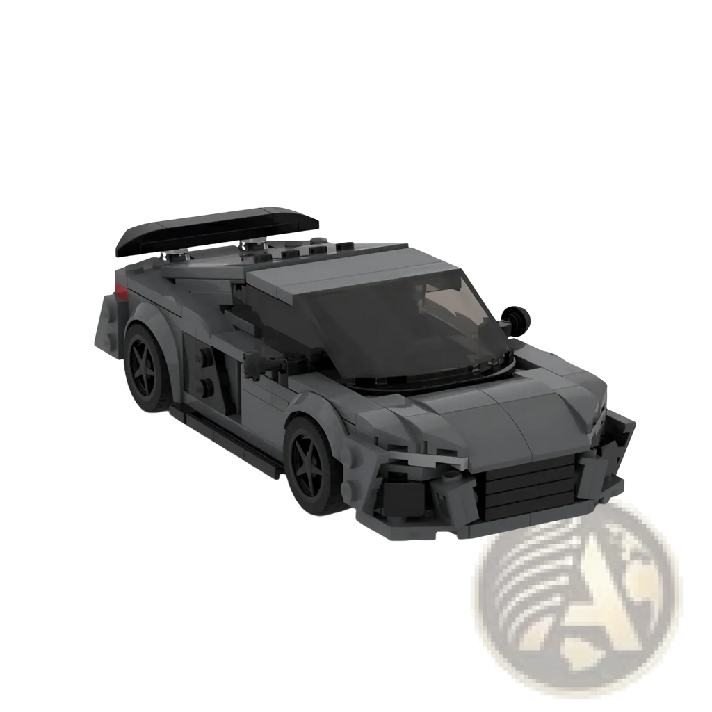 A sleek dark gray lego sports car model with black rear spoiler and detailed front grille for educational building