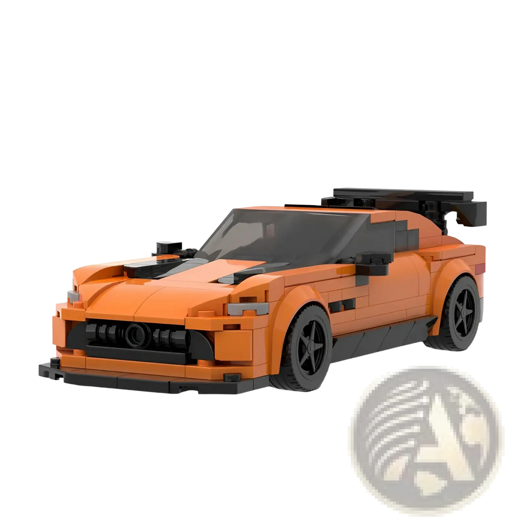 Orange and black lego racing car model with sleek aerodynamic design and prominent rear spoiler shown from the back side