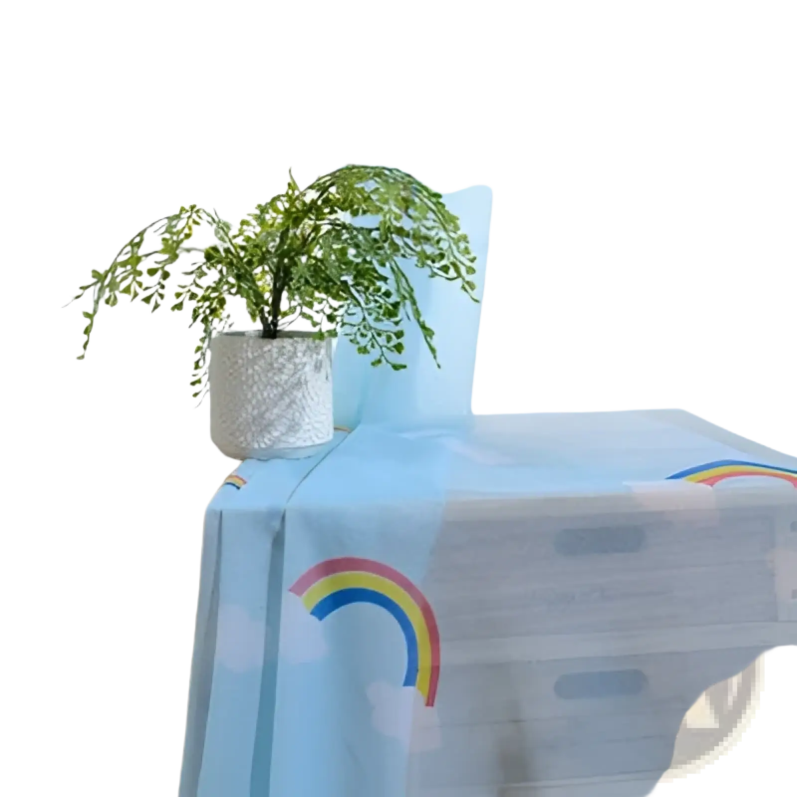 Light blue tablecloth with rainbow printed design complementing rainbow blackout and sheer curtains for kids room