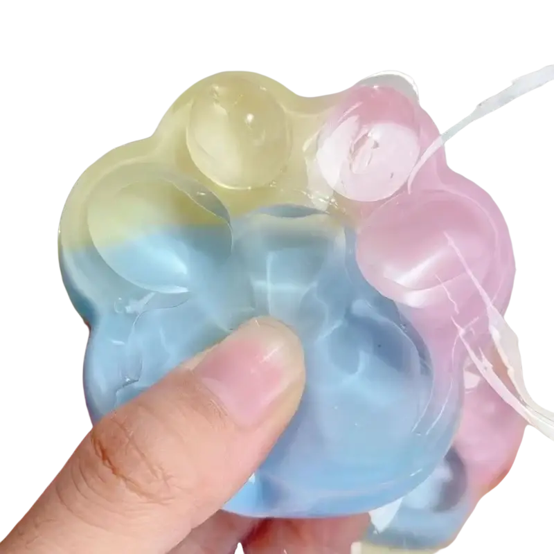 Pastel-colored silicone rainbow cat claw squishy fidget toy with cloud-like shape and soft texture