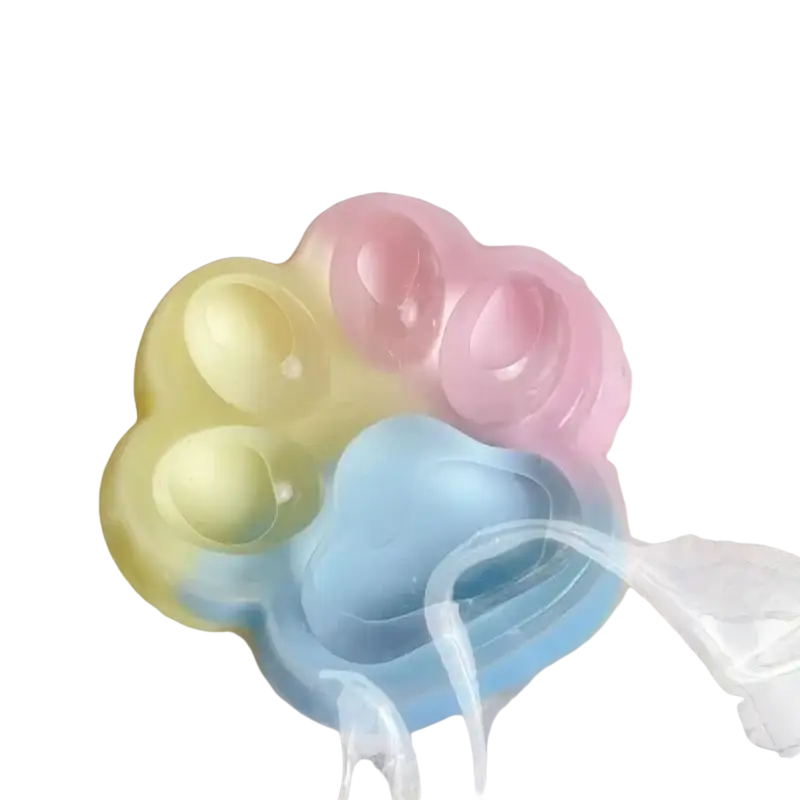 Pastel-colored translucent silicone paw-shaped rainbow cat claw squishy fidget toy with soft yellow pink and blue hues