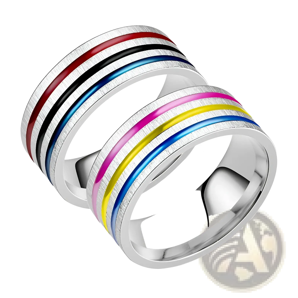 Two stainless steel unisex band rings with brushed finish and rainbow enamel inlay stripes in red black blue pink and yellow