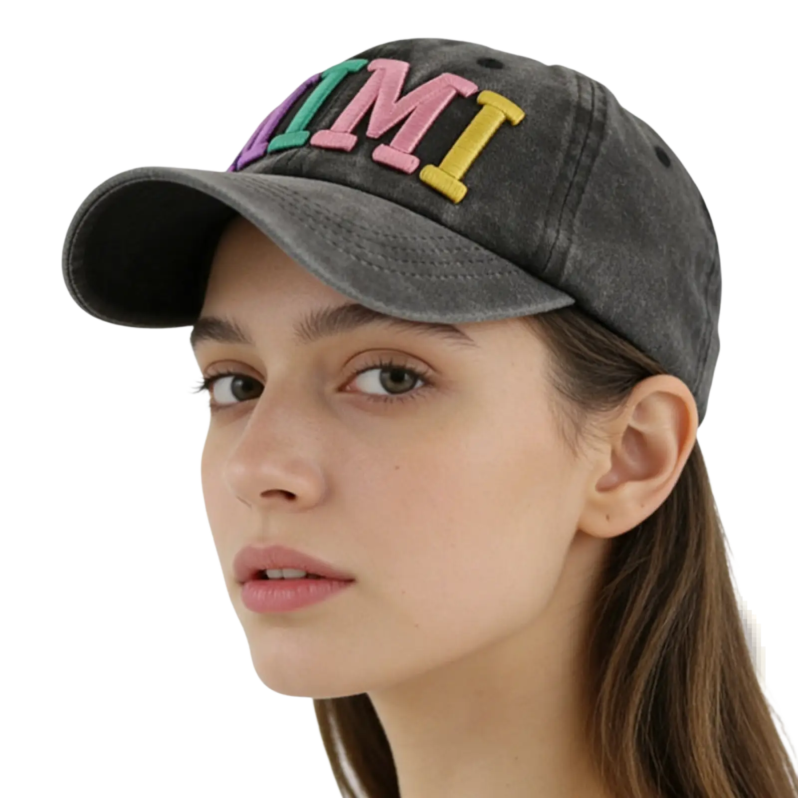 A faded black baseball cap with colorful embroidered letters spelling mimi in pink green and yellow
