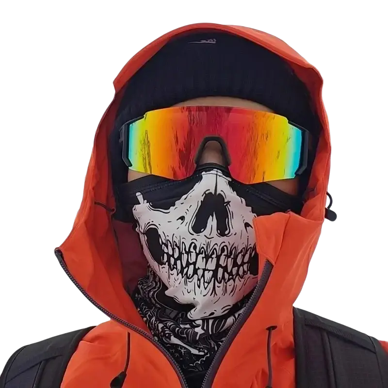 Orange hooded jacket with black skull face mask and rainbow-tinted rainbow mirror sport sunglasses white frame worn on face