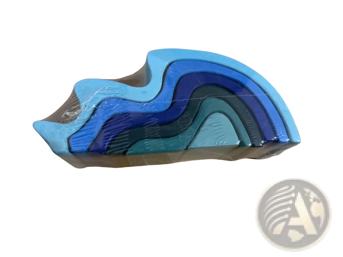 A layered wooden puzzle set with a wavy rainbow arch design in blue and teal shades for stacking and play