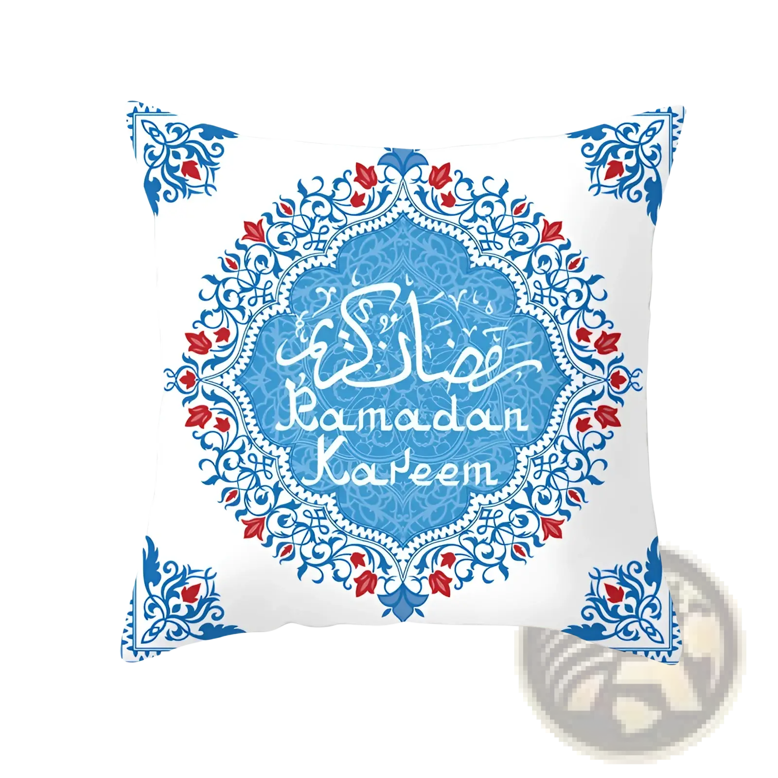 White throw pillow with blue and red ornamental patterns and Arabic calligraphy reading Ramadan Kareem in central medallion design