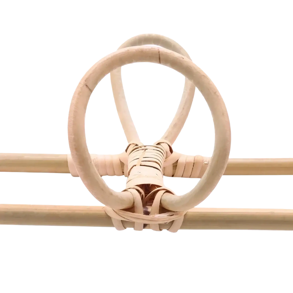 Natural-toned rattan 5 hook kids wall hanger organizer with woven detailing and minimalist bohemian design