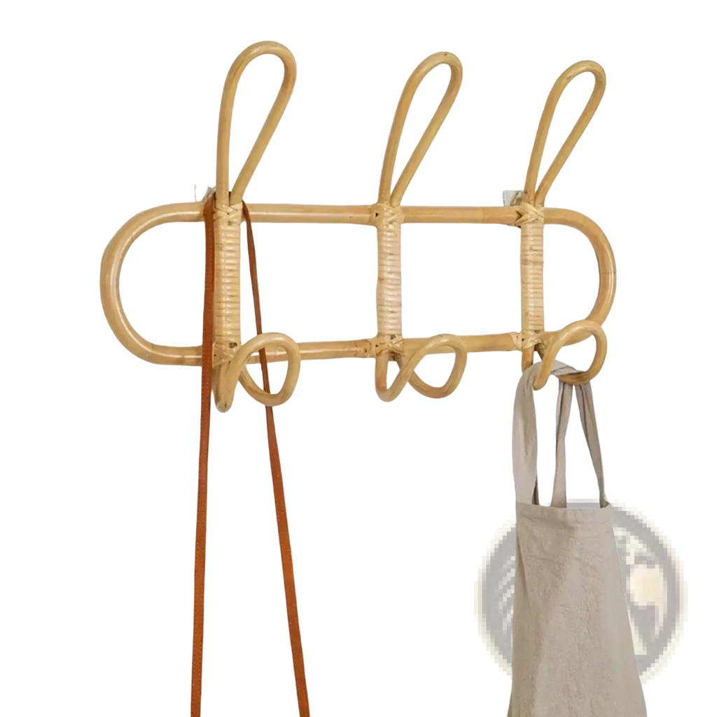Natural-toned rattan kids wall hook clothing storage rack with three curved hooks and woven design mounted on wall