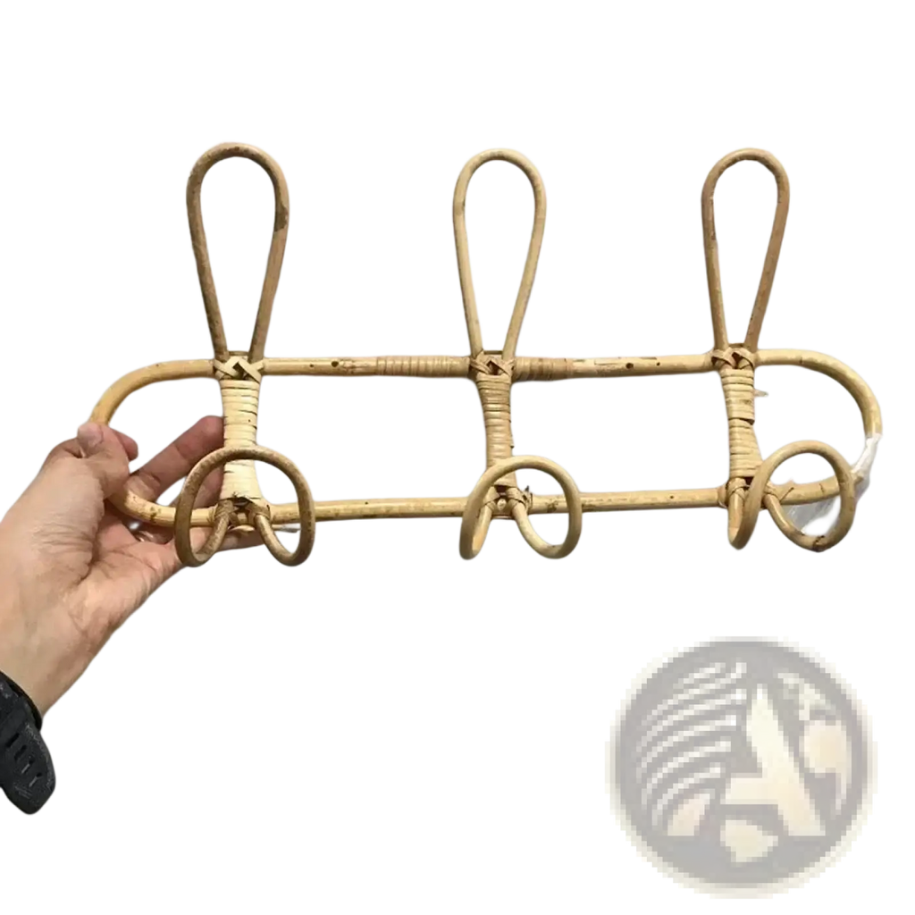 Natural-toned rattan kids wall hook rack with three curved hooks and woven rustic design for clothing storage