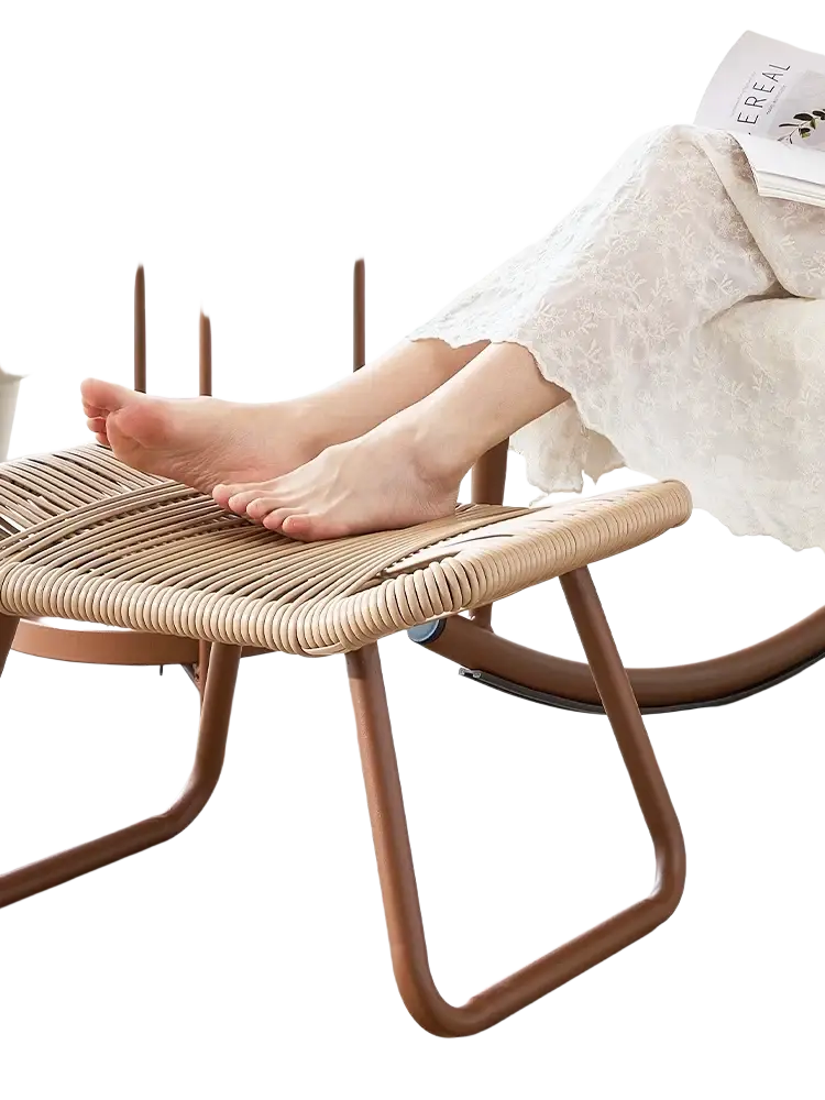 Beige woven rattan under desk footrest with sleek brown metal craft frame in modern style single pedal design