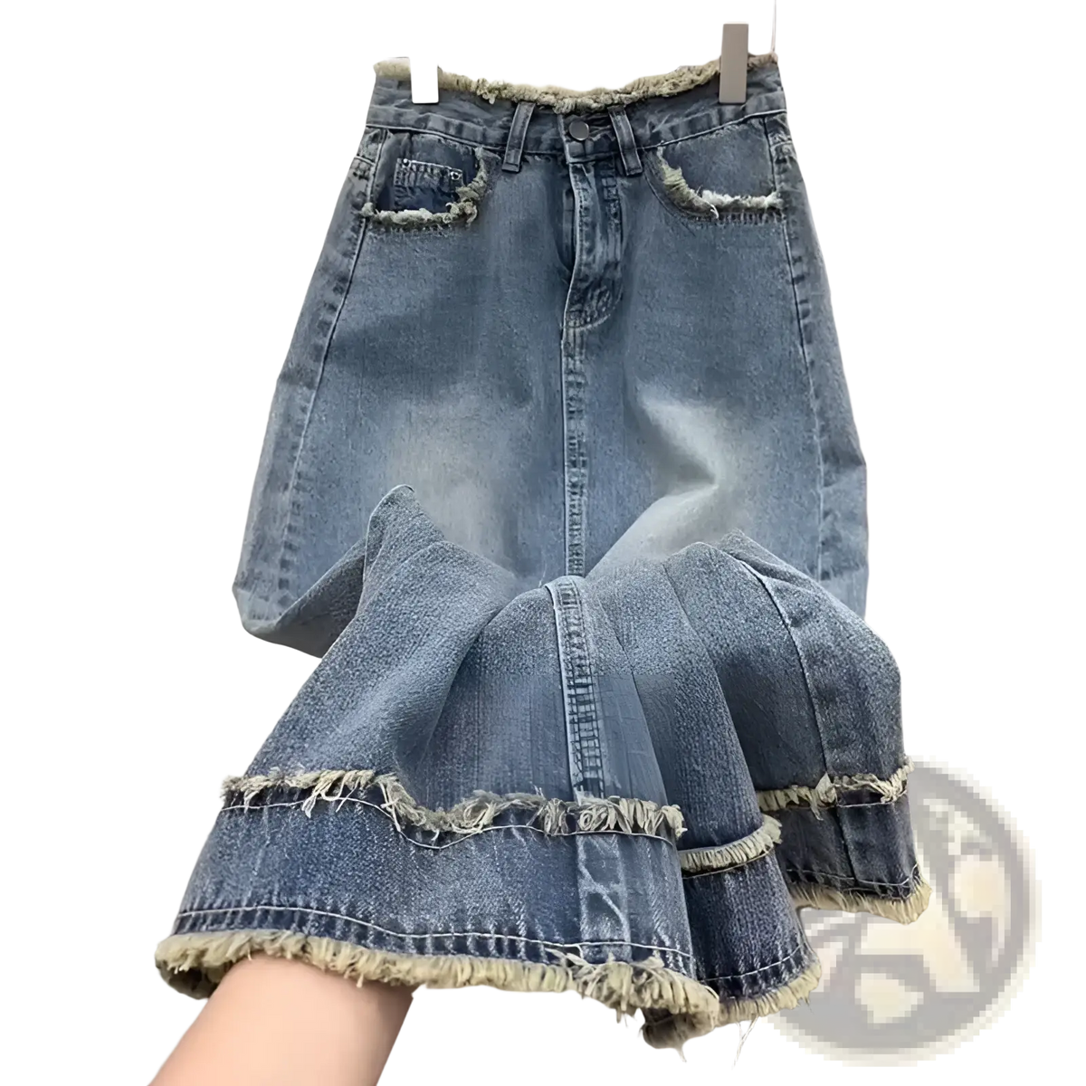Raw edge distressed denim midi skirt in blue featuring a frayed ruffled hem and distressed details
