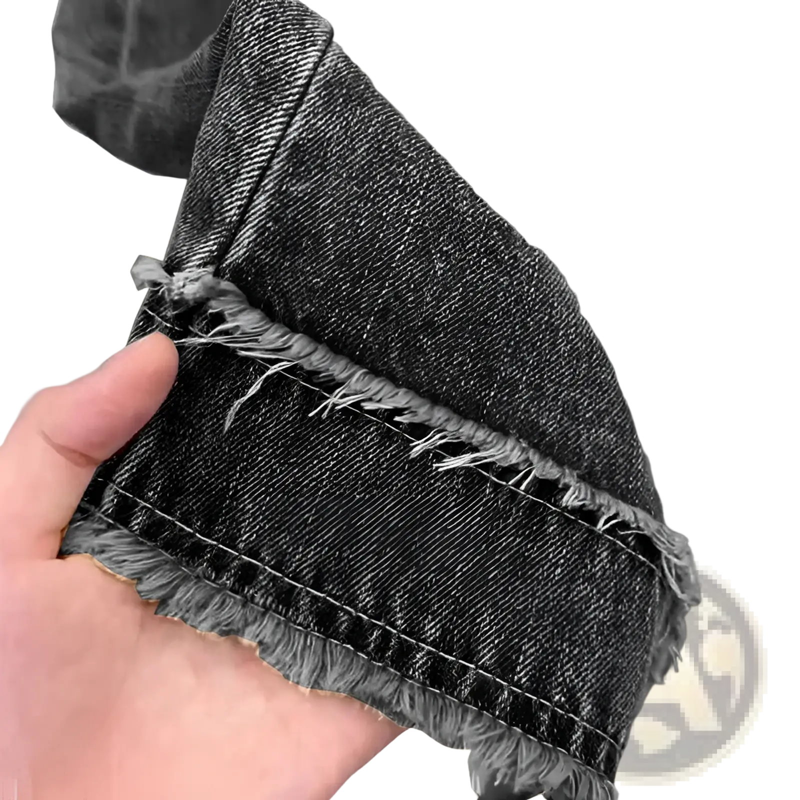 Dark-wash raw edge distressed denim midi skirt showing frayed cuff and visible stitching detail