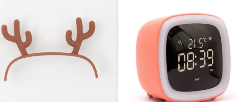 Coral-colored kids animal digital alarm clock with white trim displaying time and temperature with night light