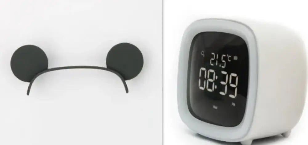 White kids animal digital alarm clock with rounded edges black display showing time temperature and night light