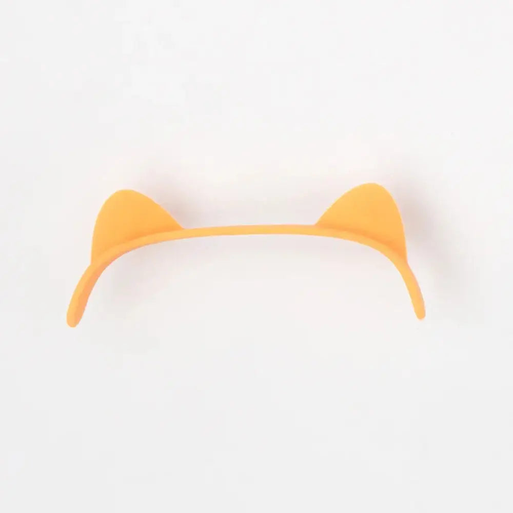 Bright orange cat ear headband displayed with kids animal digital alarm clock featuring night light and temperature display