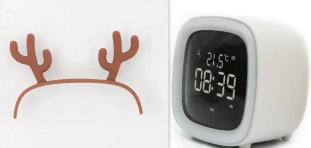 White kids animal digital alarm clock with rounded square design black display showing time and temperature