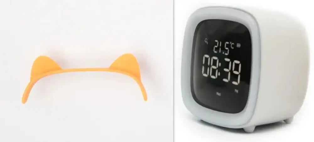 White square kids animal digital alarm clock with gray trim displaying time and temperature with night light feature