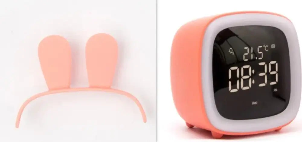 Coral-colored kids animal digital alarm clock with night light and temperature display in rounded square design with white trim