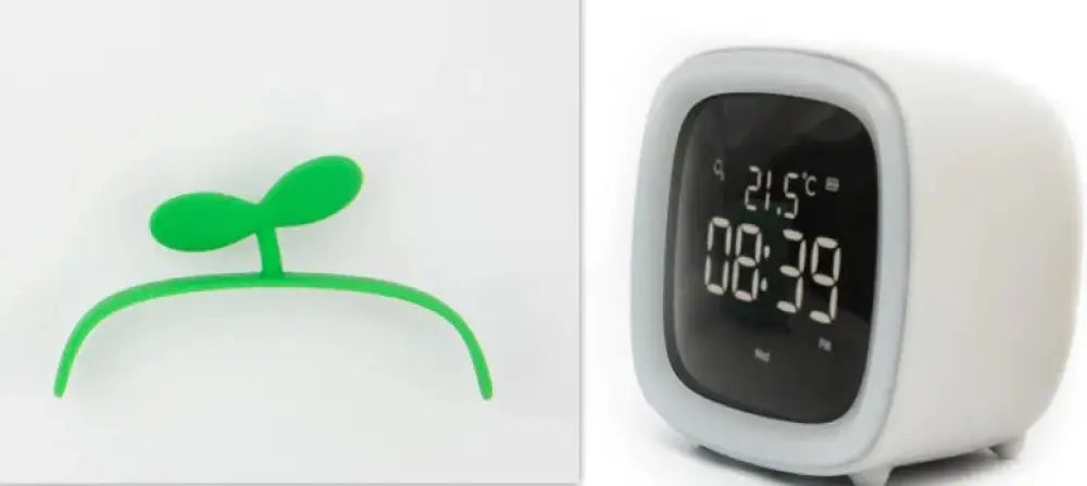 White kids animal digital alarm clock with rounded square design, black display showing time and temperature with night light