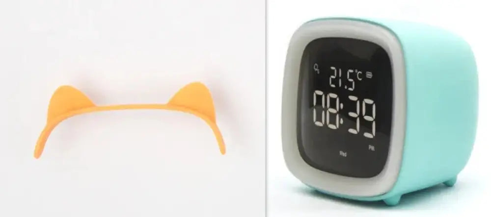 Mint green kids animal digital alarm clock with rounded edges, gray bezel, night light, and temperature display