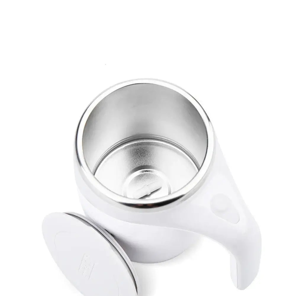 White electric self stirring magnetic coffee mug with usb charging featuring a sleek design and stainless steel interior