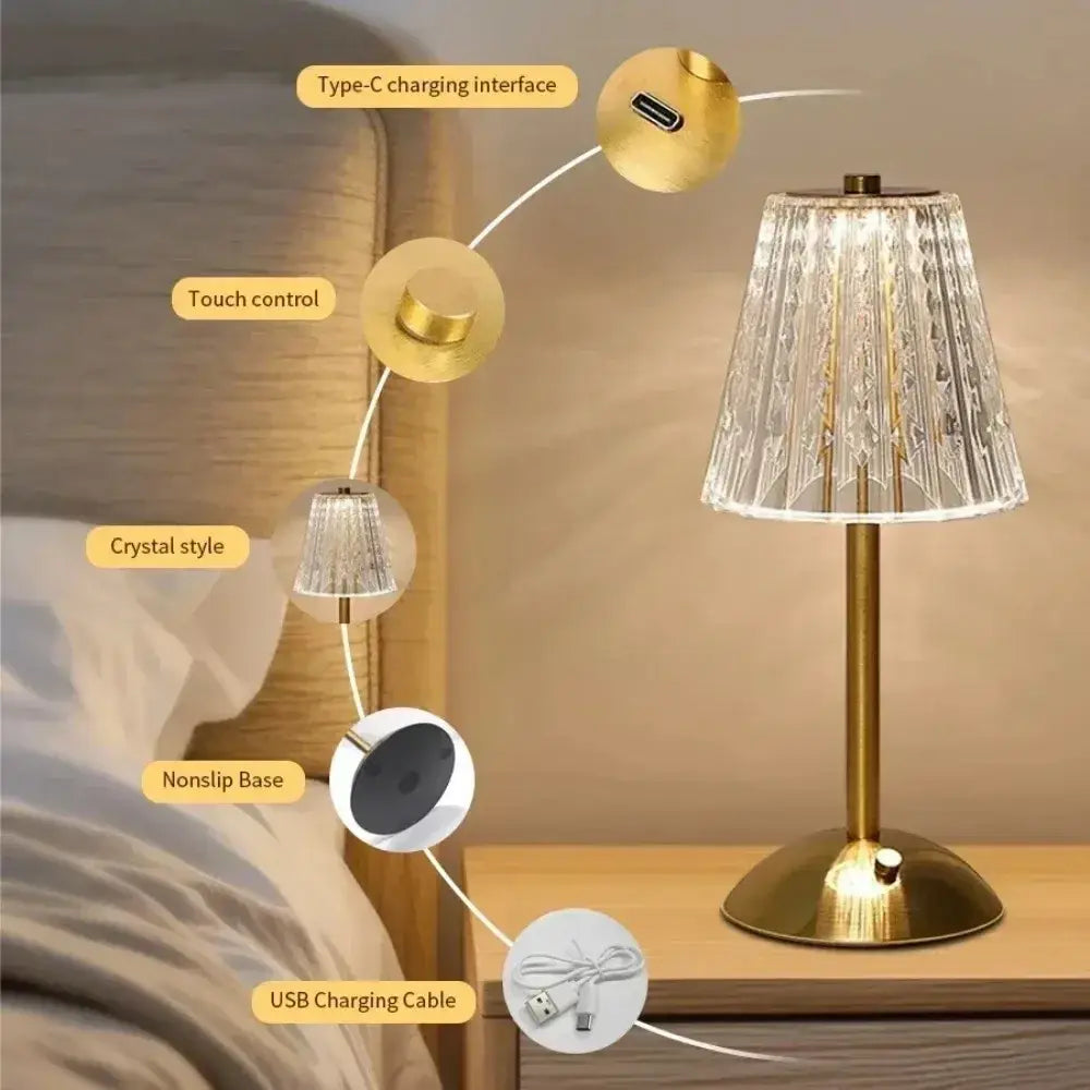 Gold finished rechargeable table lamp with a crystal style faceted glass shade light source for elegant lighting