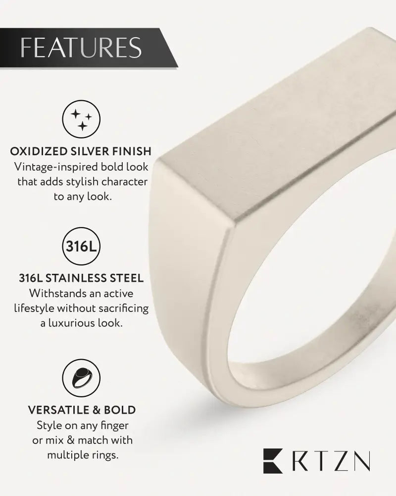 A sleek oxidized silver-toned rectangular signet ring made of 316l stainless steel for stylish wear