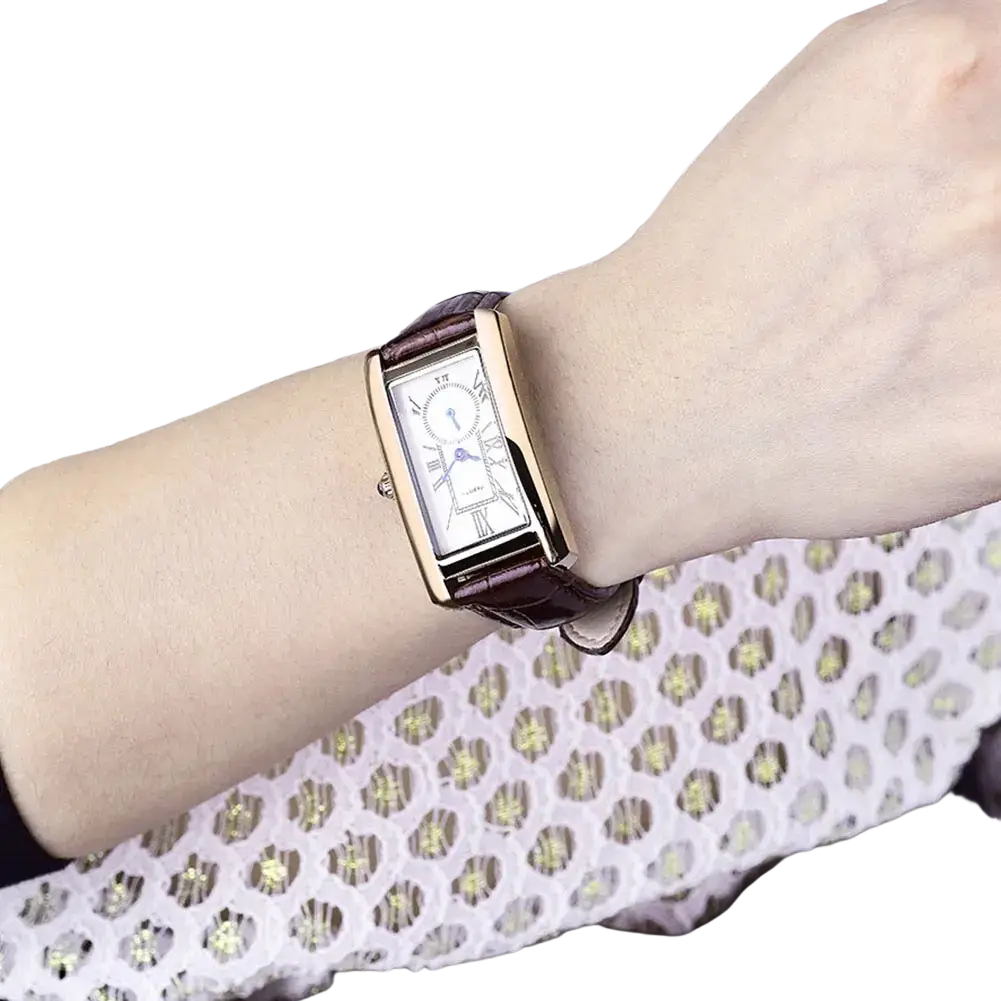 Rectangular leather quartz watch with a gold-tone case, white face with roman numerals, and a brown leather strap