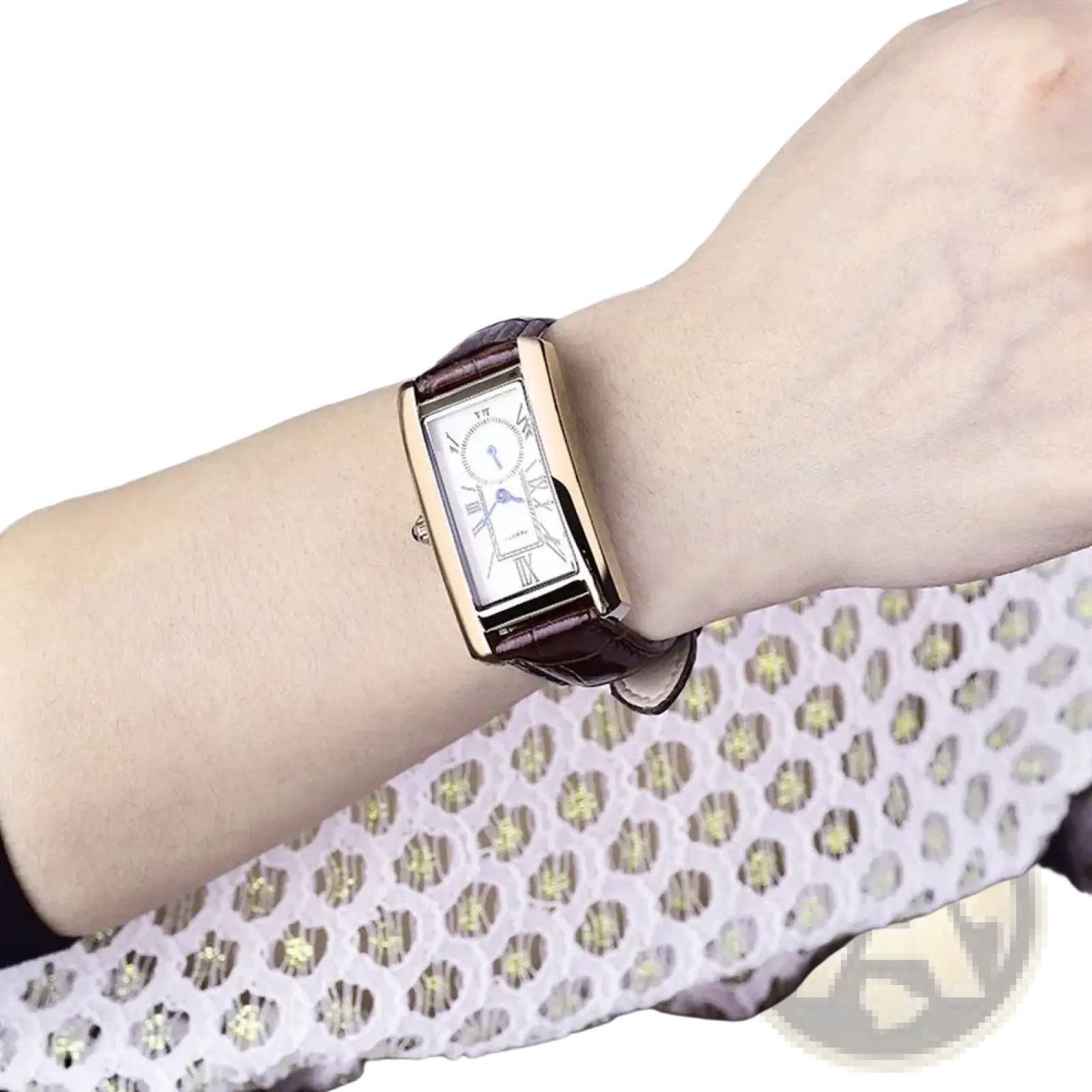 Rectangular leather quartz watch with a gold-tone case, white face with roman numerals, and a brown leather strap