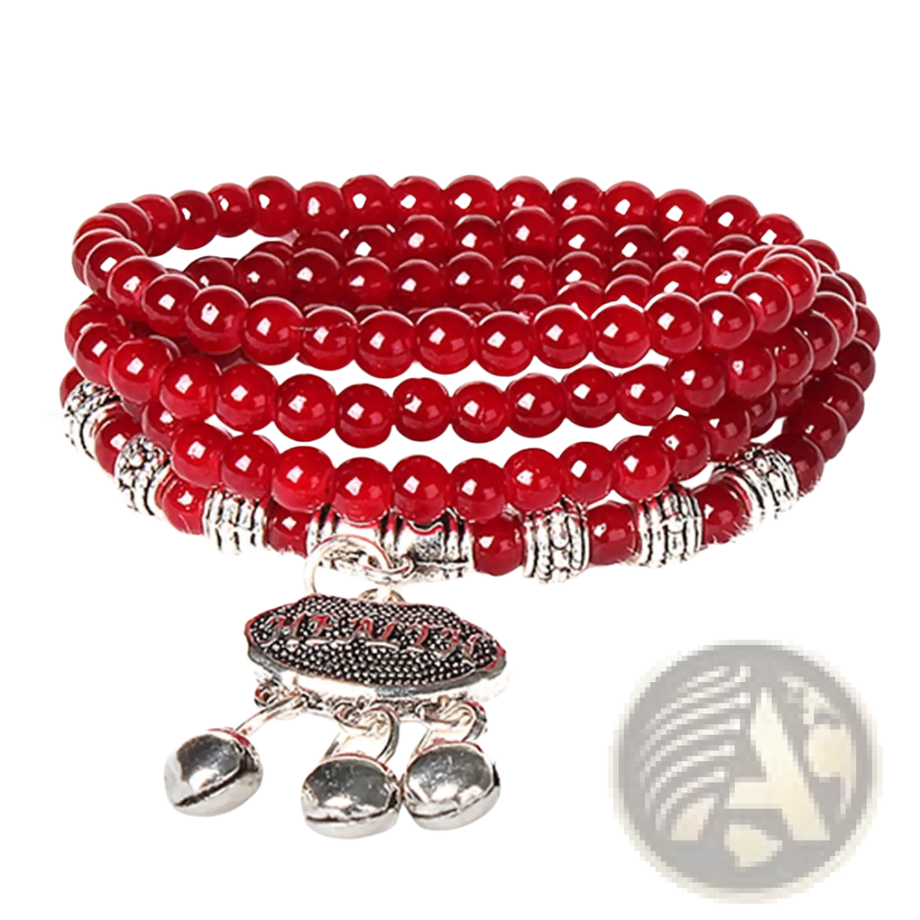 Red agate good luck bracelet with red beaded wrap design, silver-toned accents, and a dangling health charm