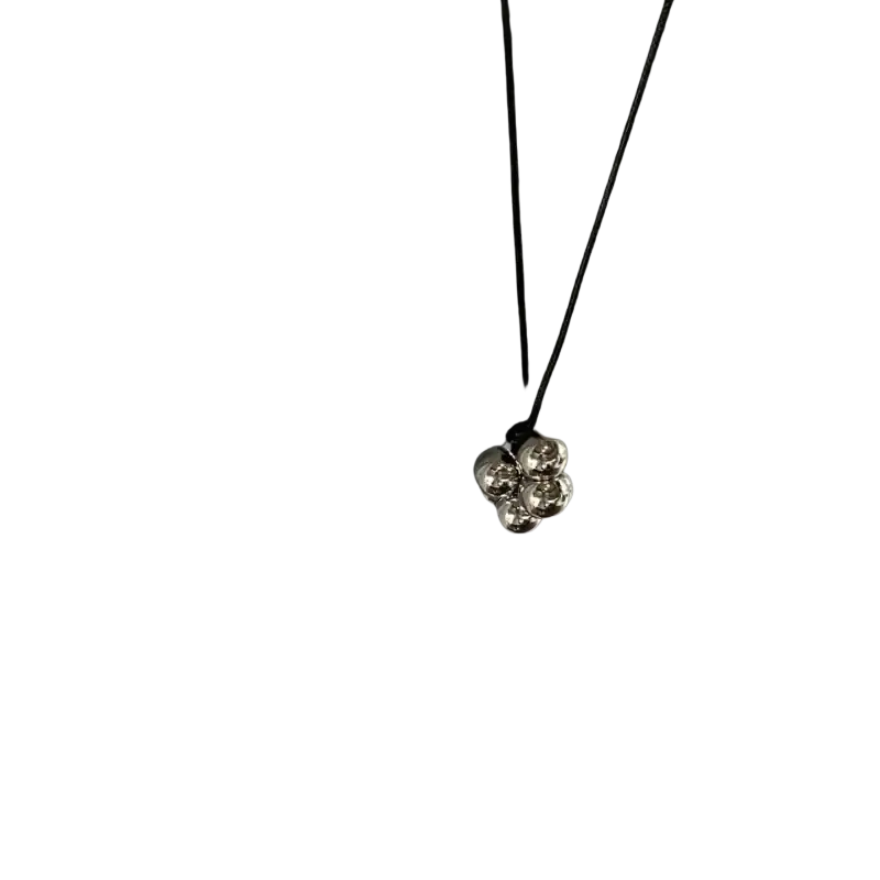Silver spherical pendant necklace with black cord featuring a red bead cluster pendant for elegant wear