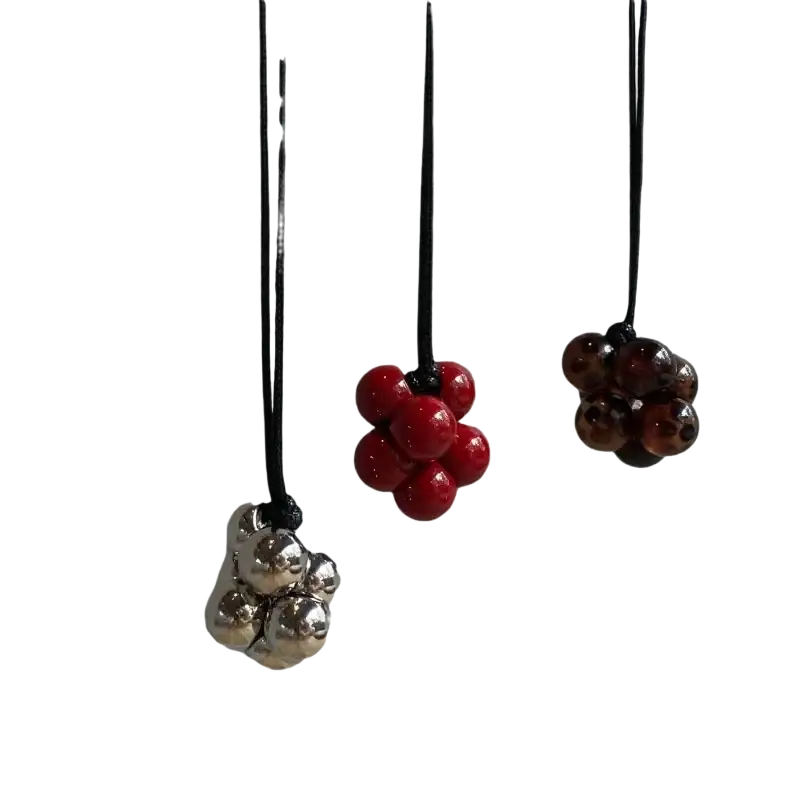 Red bead cluster pendant necklace with three silver red and burgundy spherical beads on black cord hanging clusters