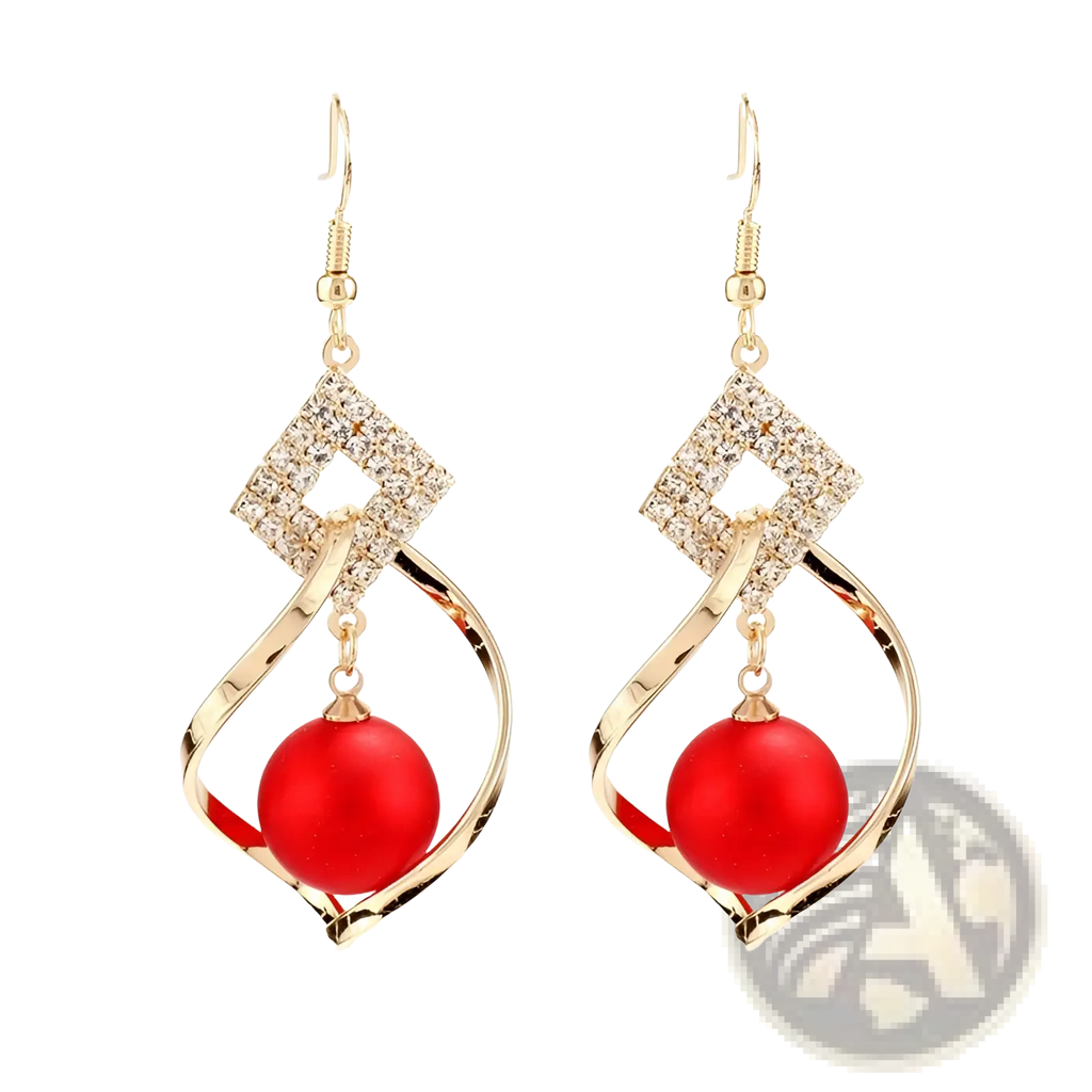 Gold-toned dangle earrings with diamond-encrusted geometric frame and vibrant red spherical bead suspended below