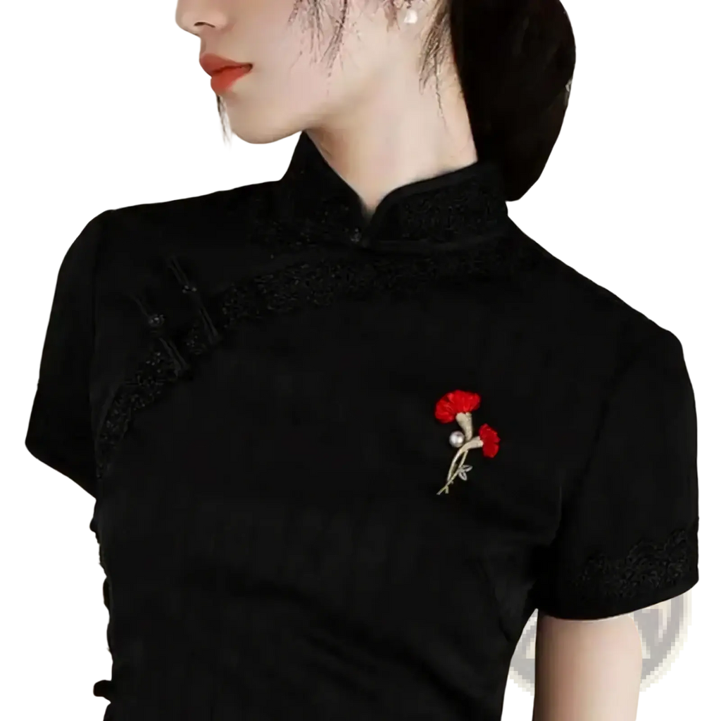 Black embroidered floral brooch with red petals and a pearl center featuring crystal accents for elegant wear