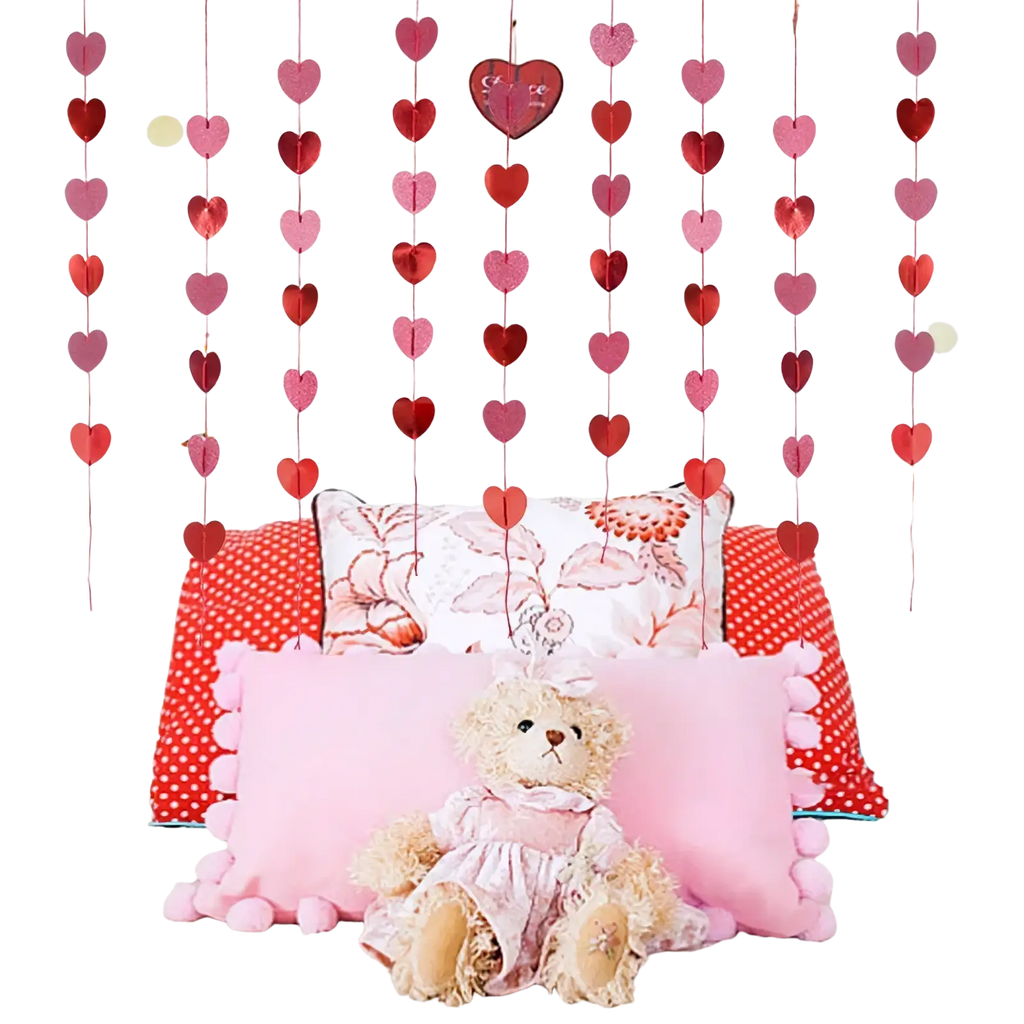 Red glitter heart garland featuring pink and red heart-shaped paper strands for valentine party decoration