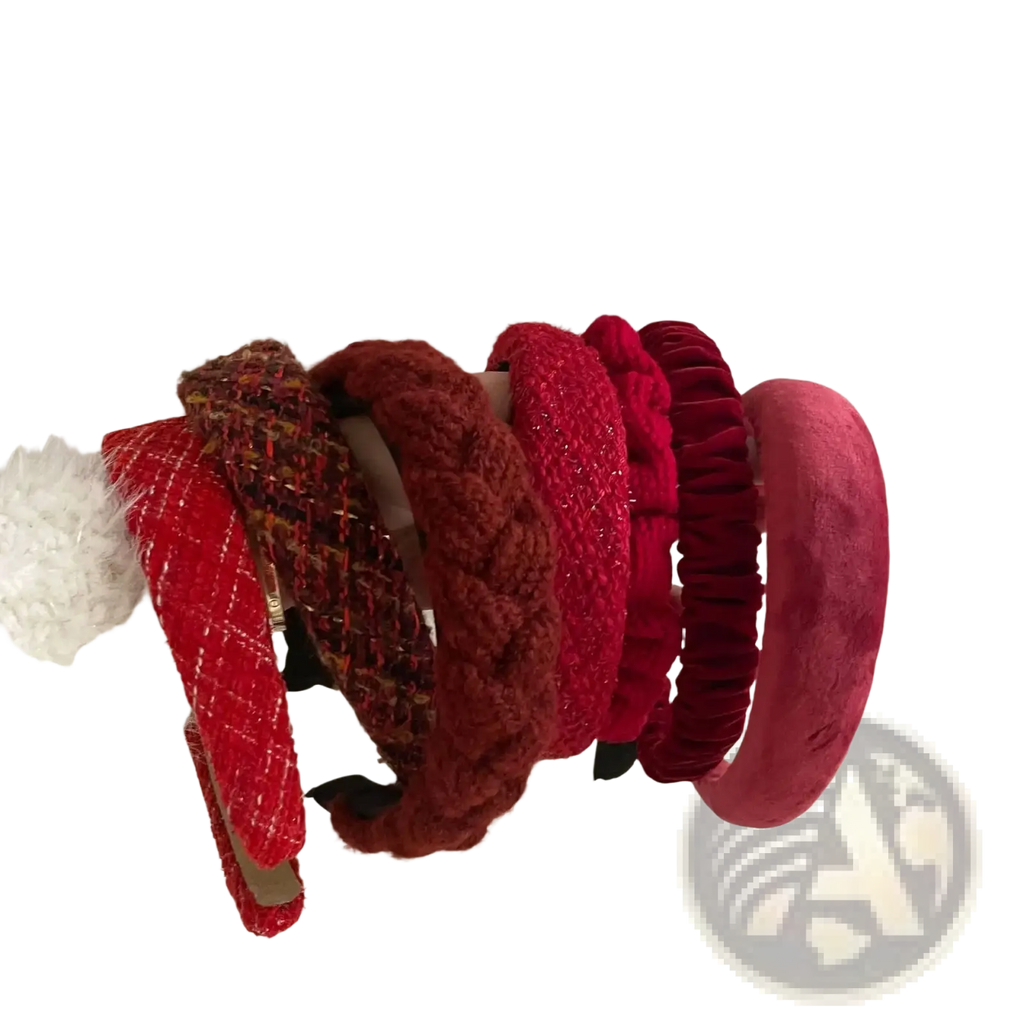 A collection of six red knitted headbands for women featuring tweed velvet braided and textured styles