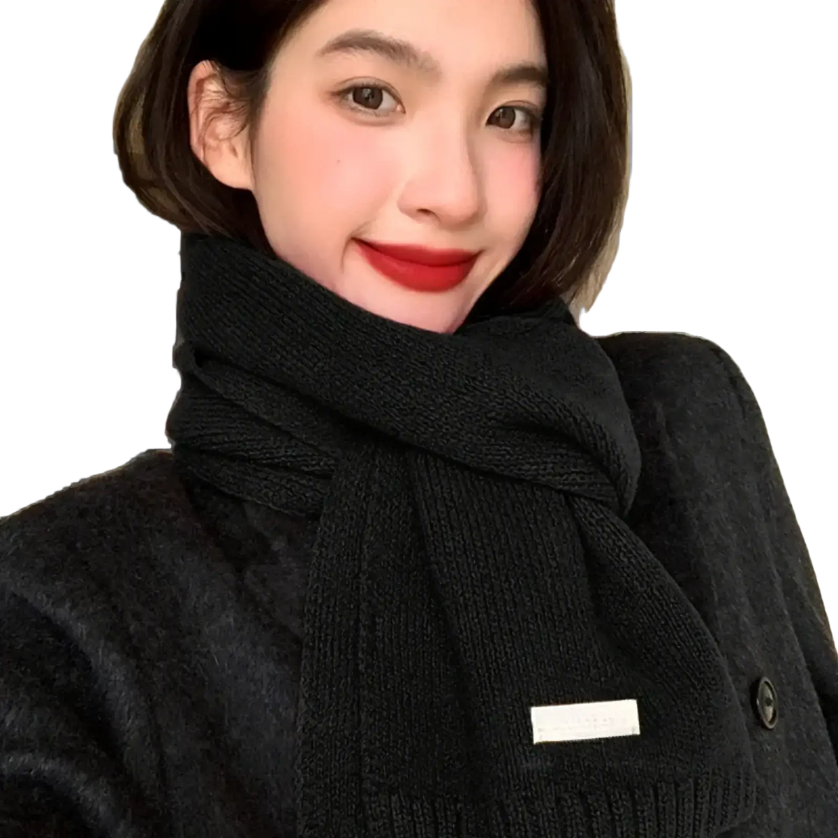 Black knitted winter scarf with ribbed texture and white tag for men and women winter scarf use