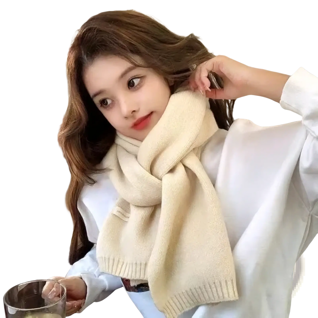 Cream-colored knitted scarf with ribbed edges designed as a red knitted winter scarf for men and women