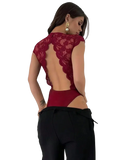 A deep red lace v-neck bodysuit with a scalloped back and cutout design shown from the back side