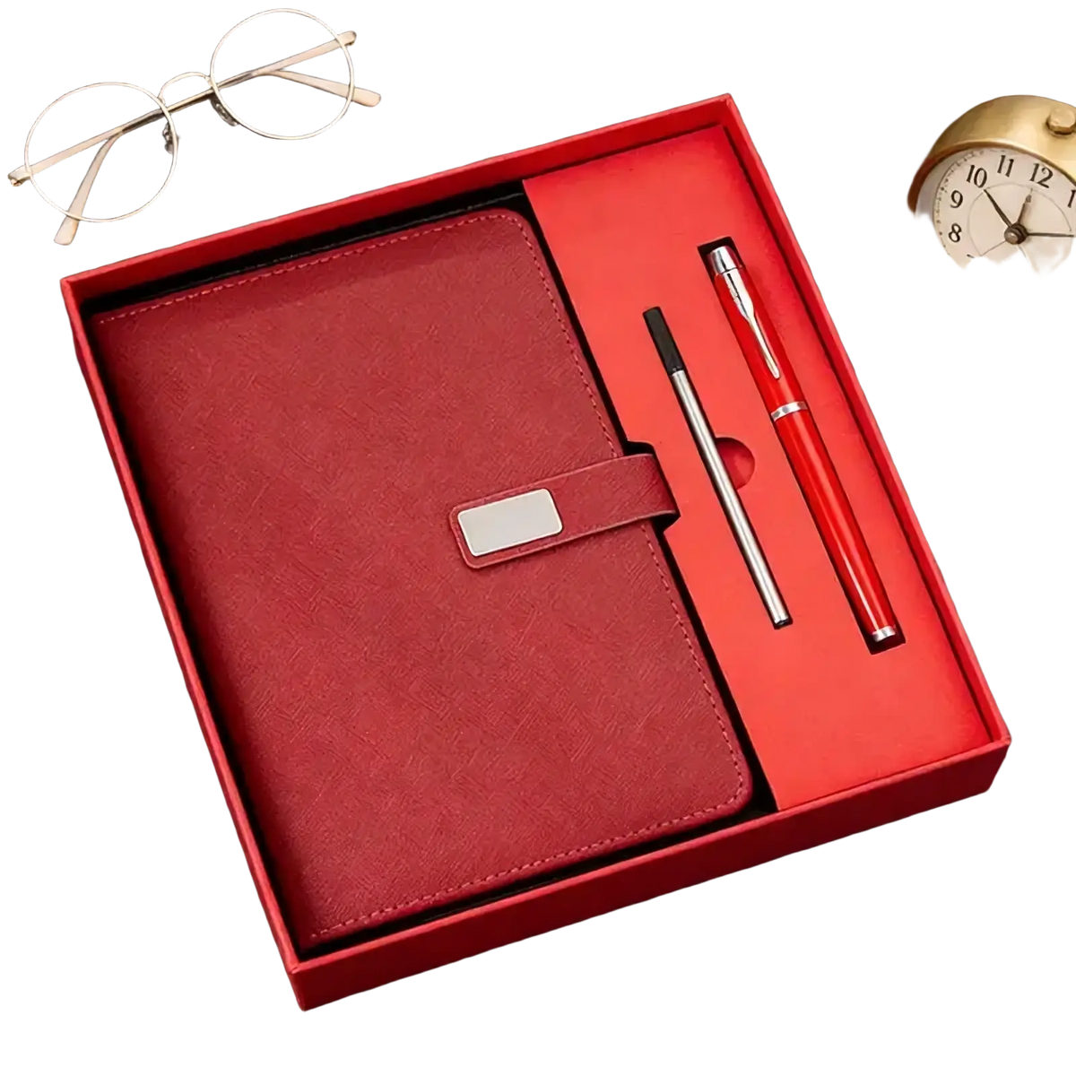 Red leather corporate gift notebook with silver clasp in matching red gift box alongside two pens