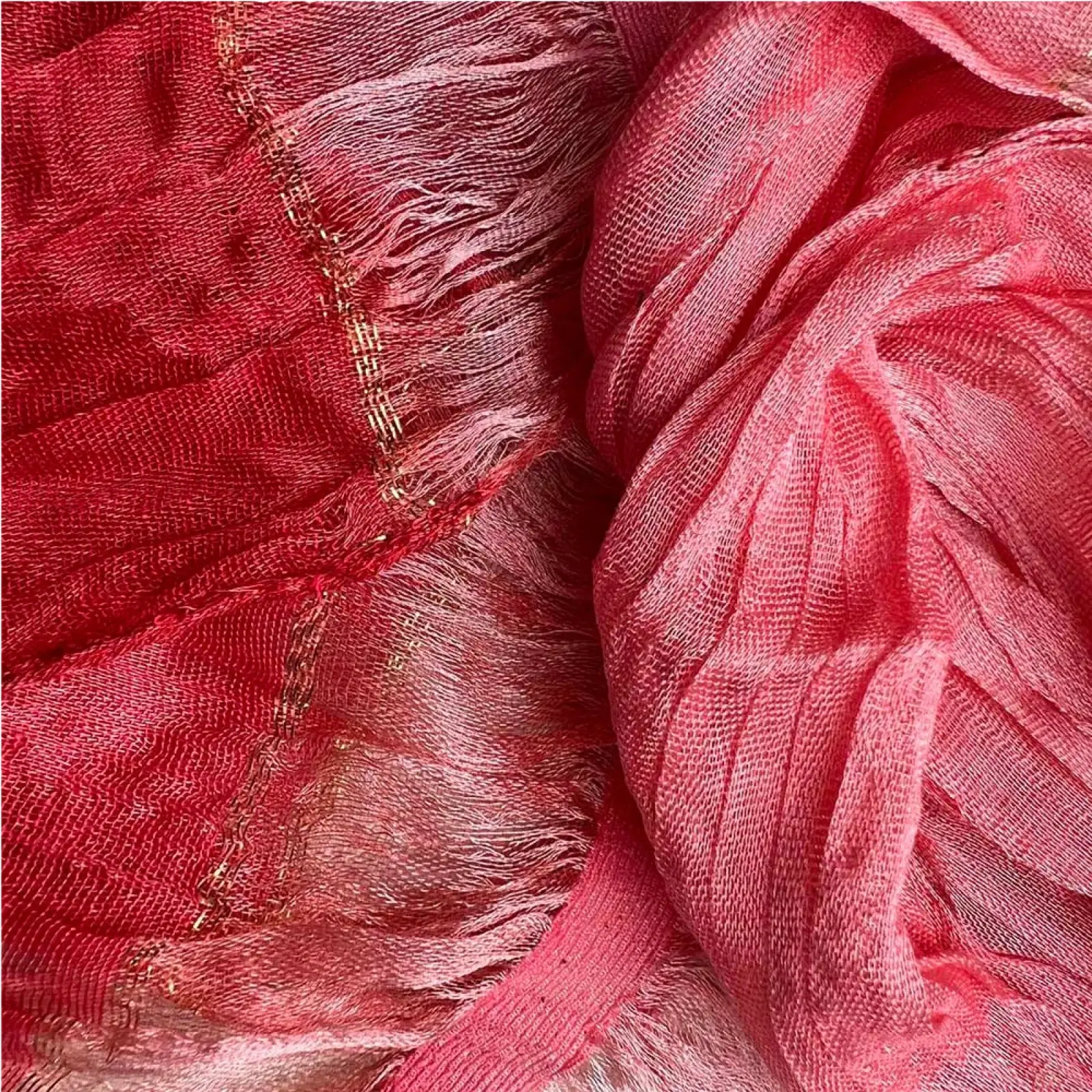 Red metallic skinny long scarf in soft textured pink fabric with subtle gradient and delicate gold thread edge detailing