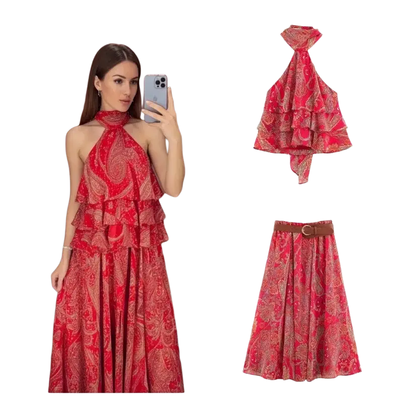 Red paisley halter top and midi skirt set featuring tiered ruffles and a flowing silhouette in vibrant red fabric