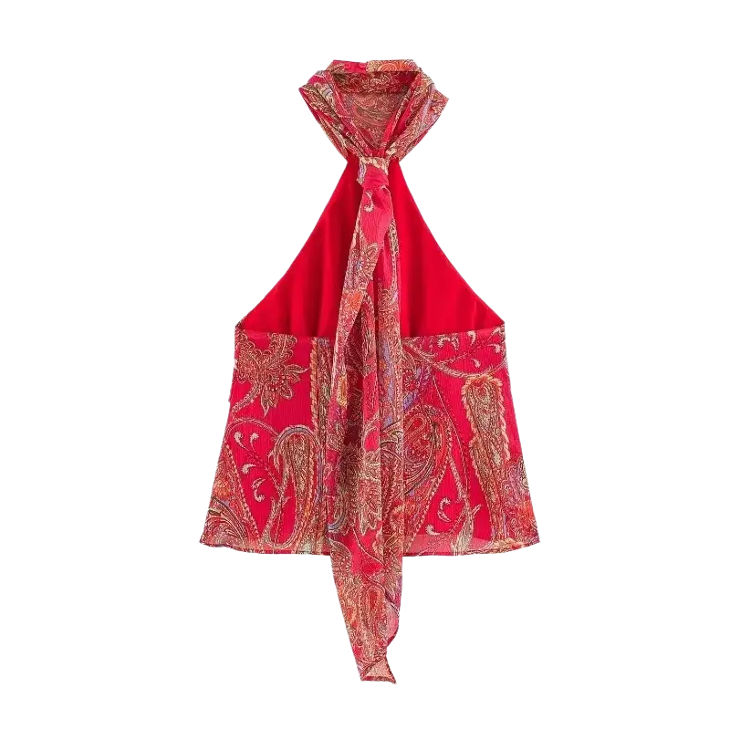 A vibrant red paisley halter top with sheer fabric, two front pockets, and a flowing scarf tied at the neck