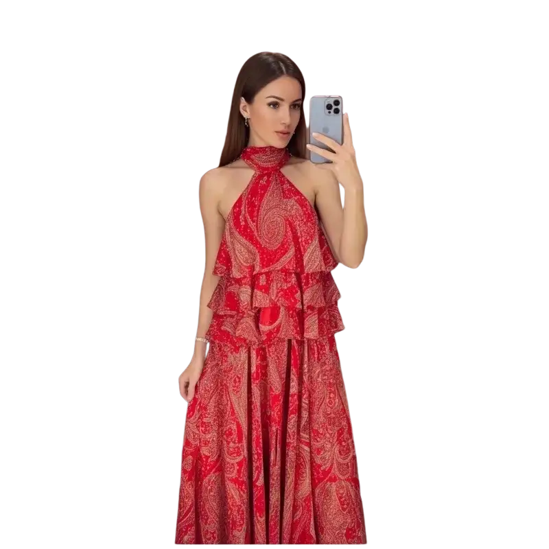 Red paisley halter top and midi skirt set featuring a vibrant red paisley pattern with layered ruffles